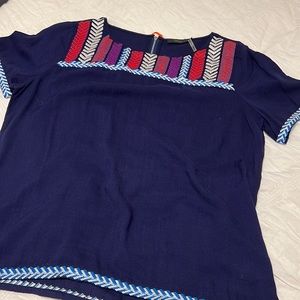 Women’s new never worn embroidered detail blouse